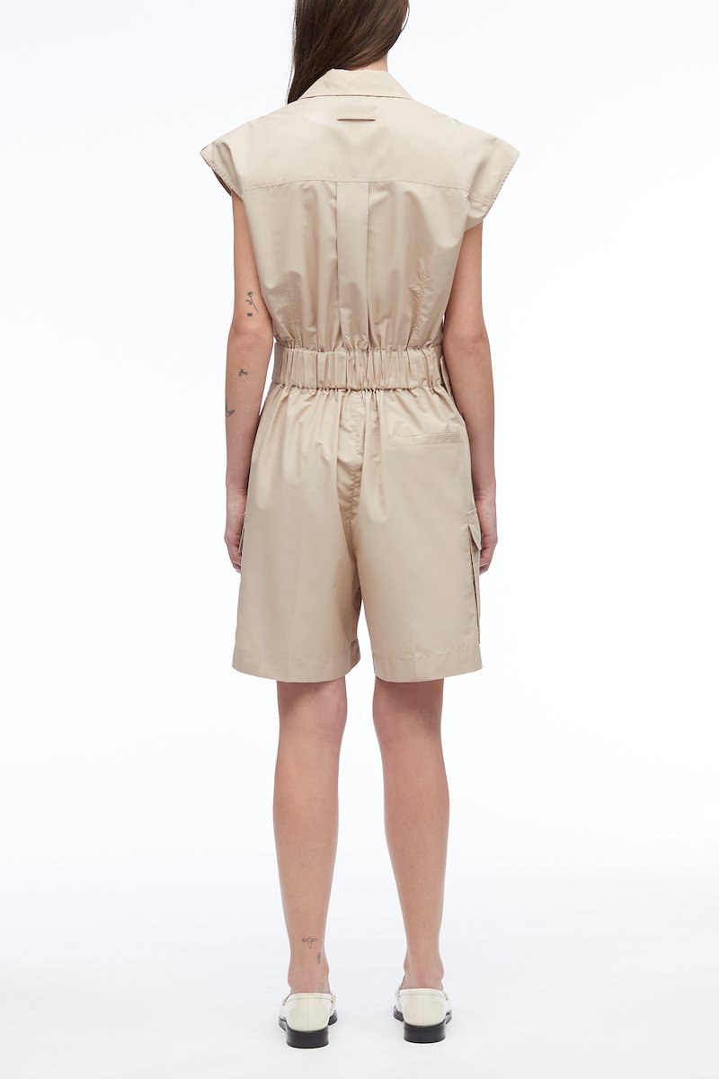 Sleeveless Utility Collared Romper-neutrals #0 Sleeveless Utility Collared Romper, pleat detail belted playsuit from 3.1 PHILLIP LIM featuring sand beige, cotton blend, pleat detailing, belted waist, classic collar, rear elasticated waistband, chest patch pocket, two side flap pockets and short sleeves.- 2