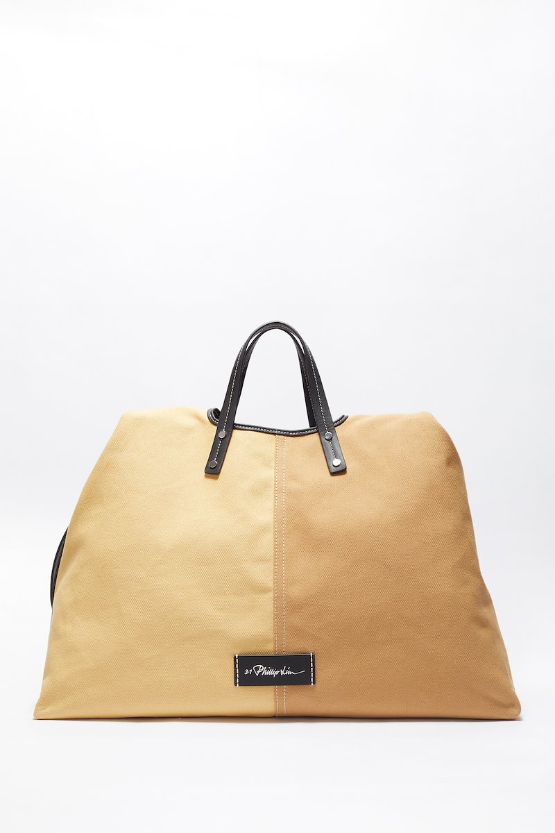 Large Prism Tote-brown #0 Large Prism Tote, large Prism tote bag from 3.1 PHILLIP LIM featuring coffee brown, beige, two-tone design, logo patch to the front, side zip fastening, two top handles, thin shoulder straps, main compartment and removable pouch.- 2