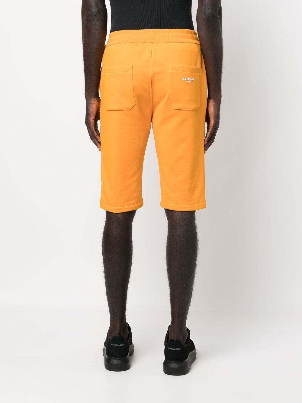Shop Balmain Drawstring-waist Cotton Shorts In 橘色