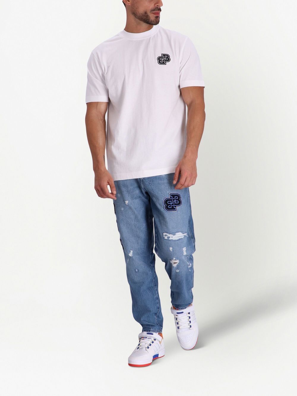 Shop Hugo Boss All-over Logo Patch Jeans In Blue
