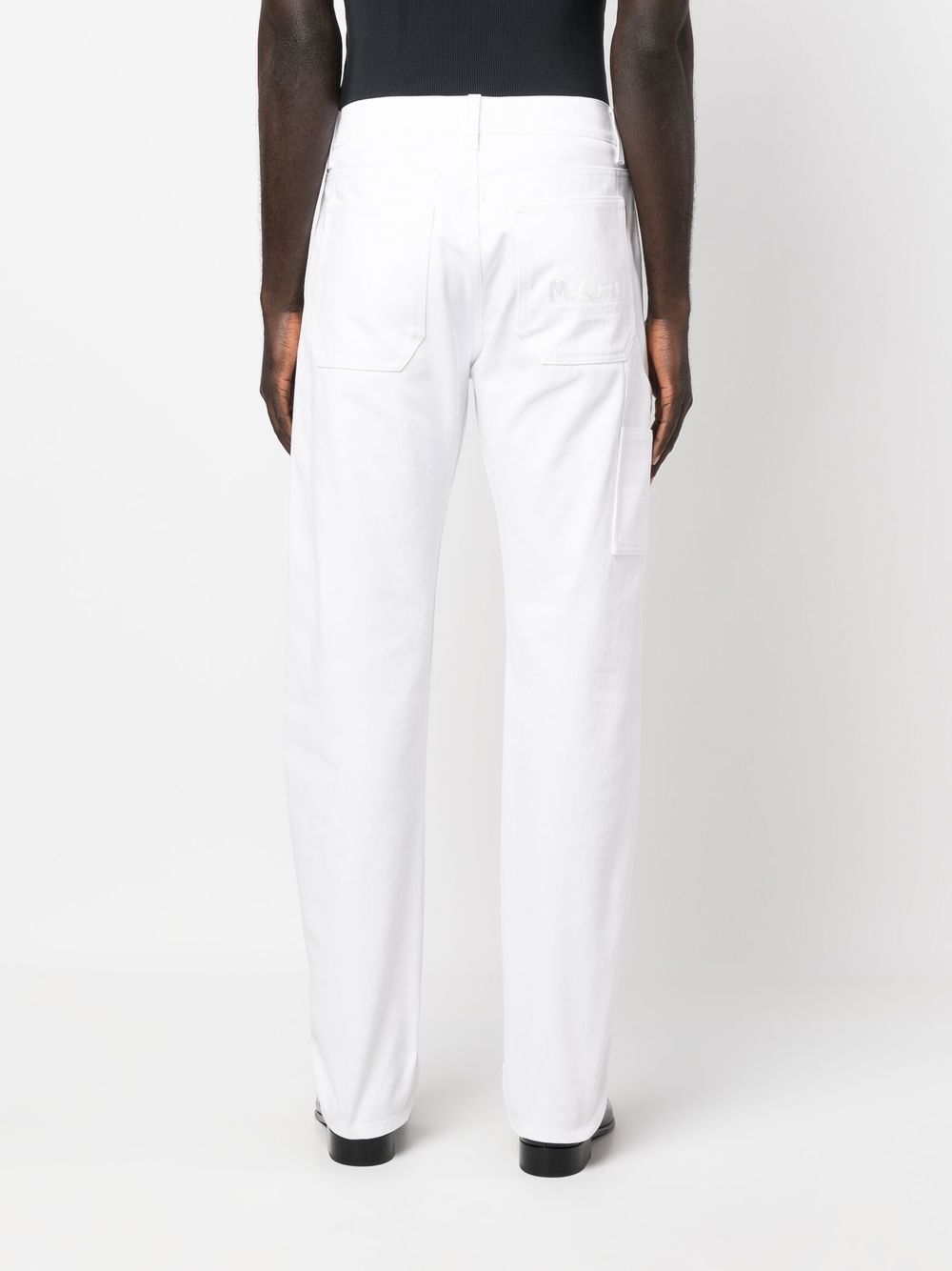 Shop Alexander Mcqueen Logo-embroidered Slim-fit Jeans In White