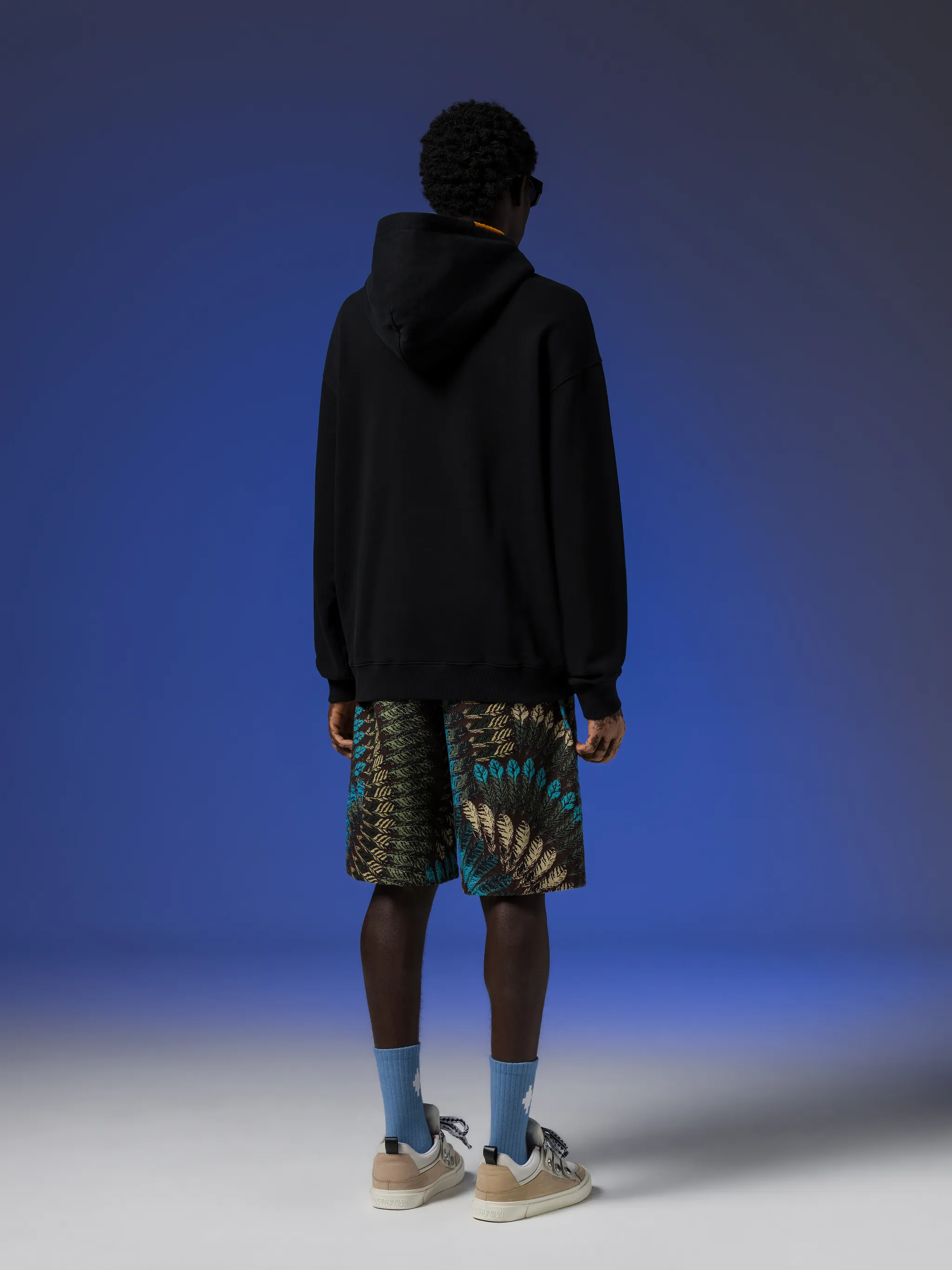 Cross-embroidered drawstring hood from Marcelo Burlon County of Milan featuring black, organic cotton, signature Cross motif, contrast stitching, drawstring hood, drop shoulder, long sleeves, ribbed cuffs, front pouch pocket and ribbed hem. Conscious: This item is made from at least 50% organic materials.