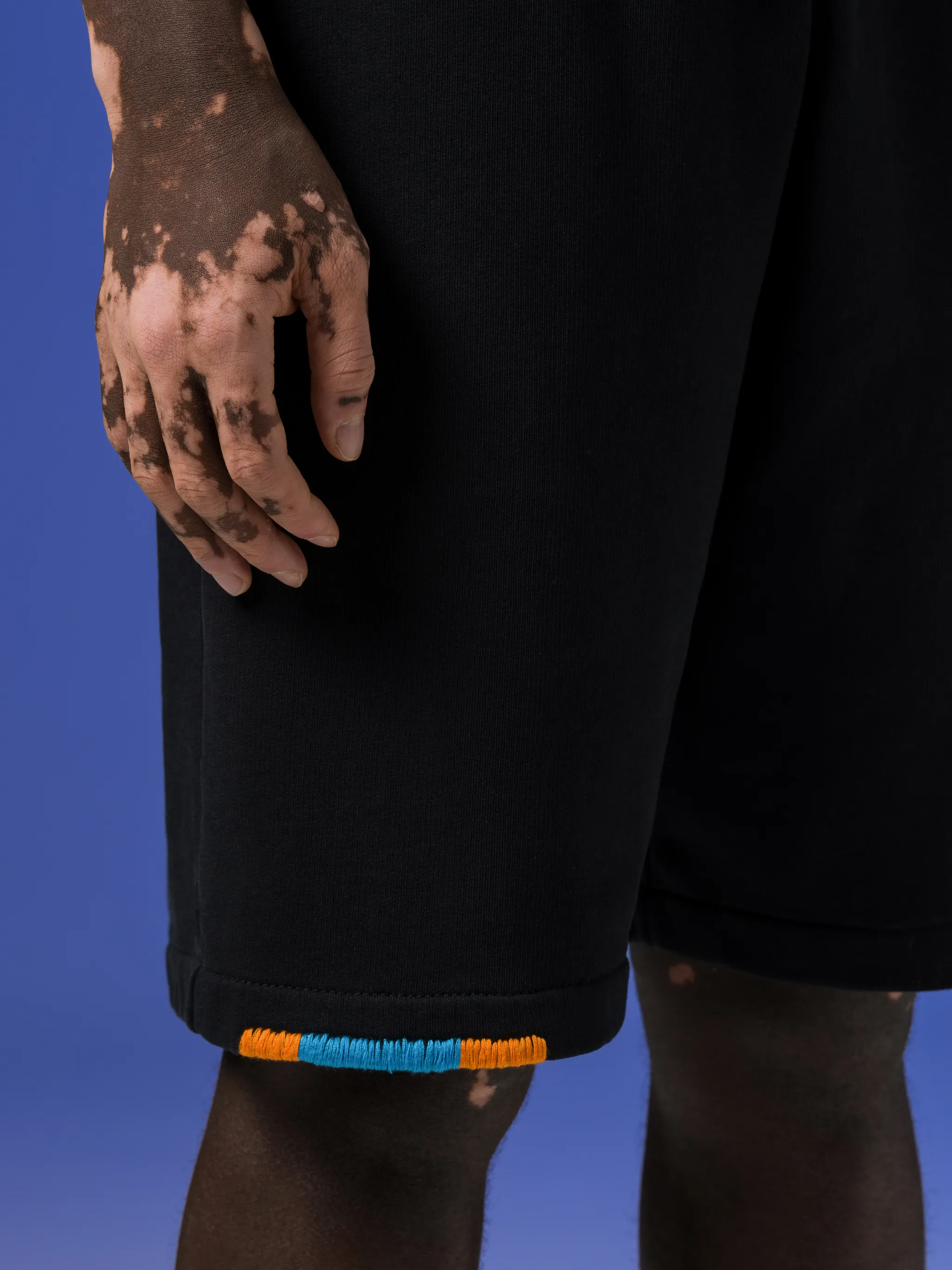 Stitch Cross track shorts from Marcelo Burlon County of Milan featuring black, organic cotton, embroidered motif, contrasting trim, elasticated drawstring waistband, two side inset pockets, rear welt pocket and straight leg. Conscious: This item is made from at least 50% organic materials.