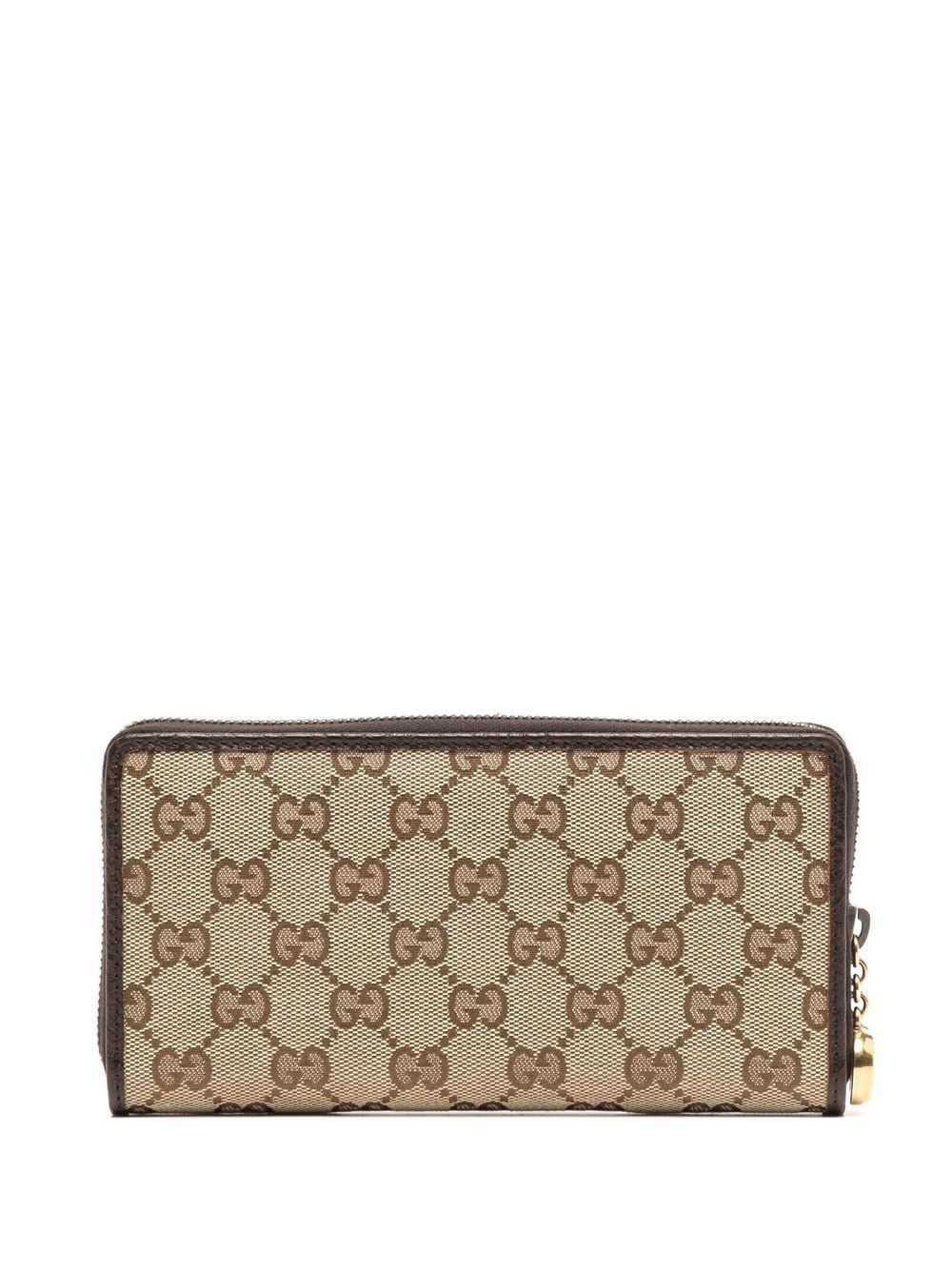 Gucci Portemonnee met GG print - Bruin