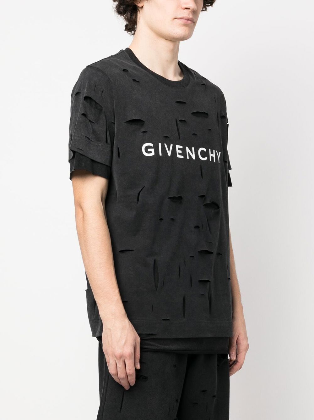 Shop Givenchy Ripped Logo-print T-shirt In Black