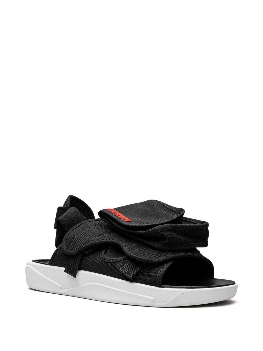 Shop Jordan Ls "black/white" Slides