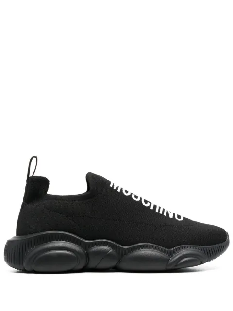 Moschino - logo-lettering low-top sneakers