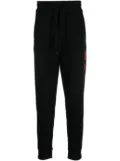 BOSS logo-print detail track pants - Black