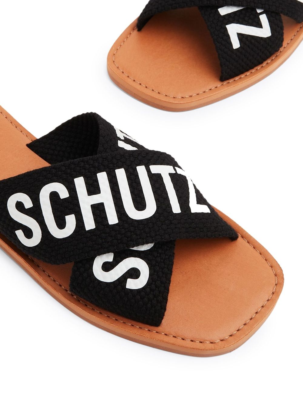 Shop Schutz Logo-print Flat Leather Slides In Schwarz