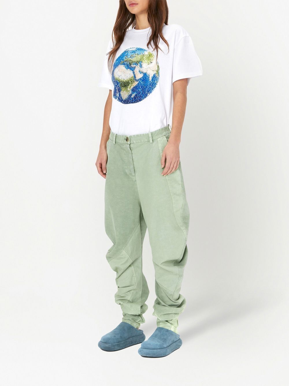 Shop Jw Anderson Twisted Cotton Trousers In Green