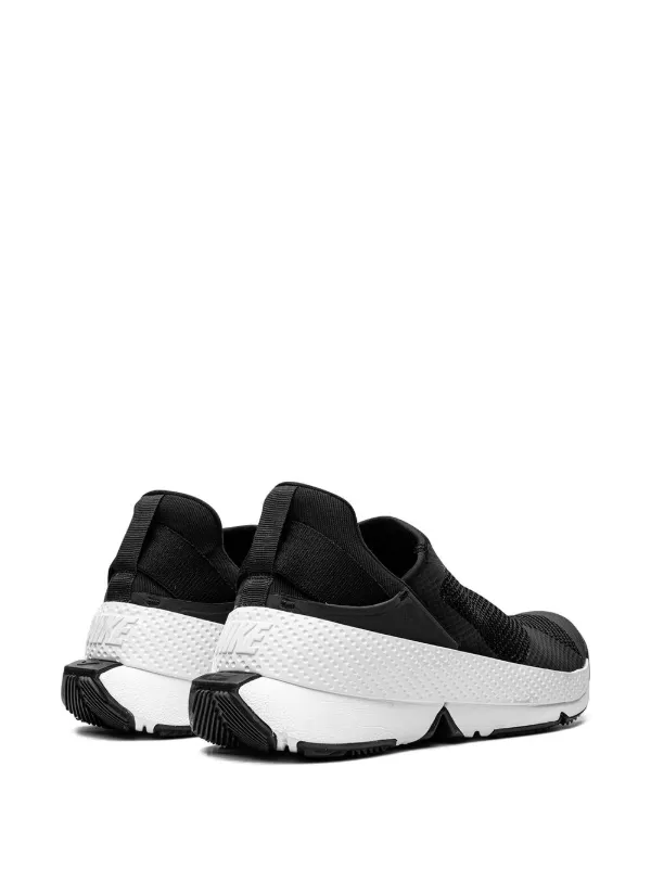 Nike black and white slip ons deals