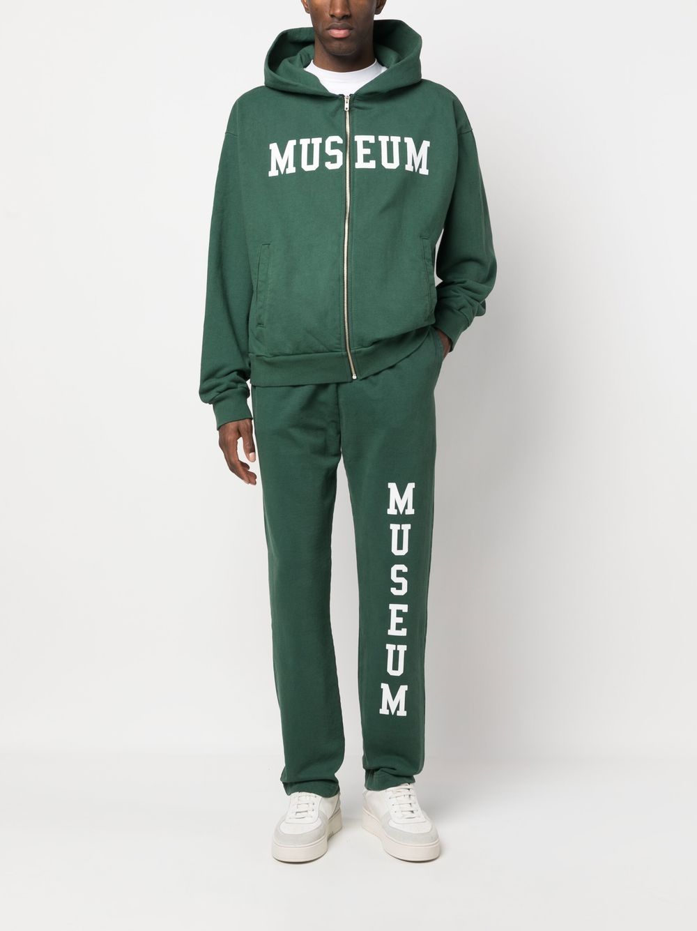 Shop Museum Of Peace And Quiet Logo-print Cotton Pants In Green
