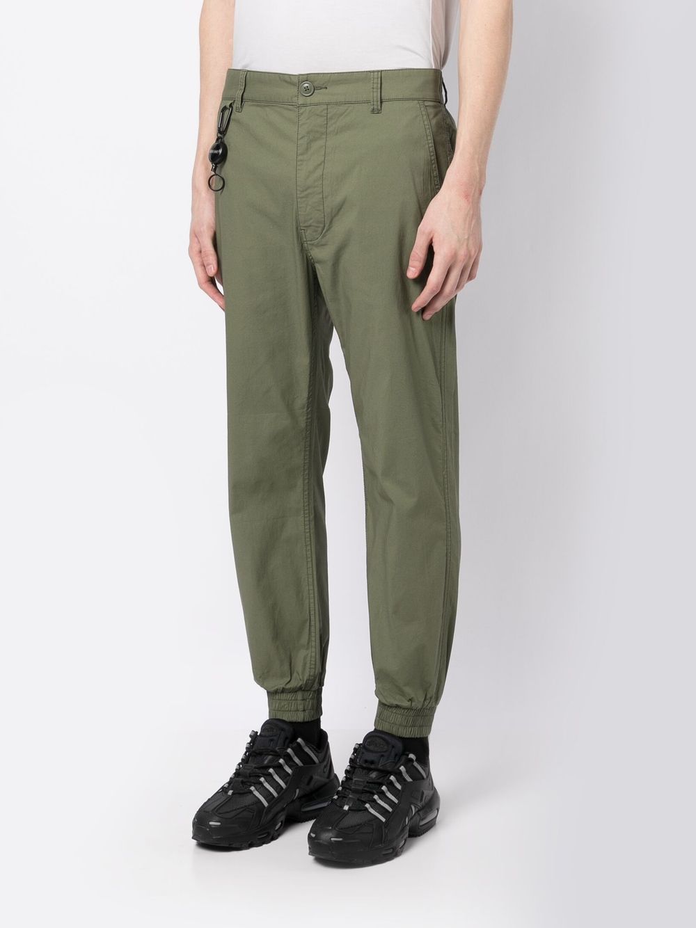 Shop Izzue Stretch-cotton Tapered Trousers In Green