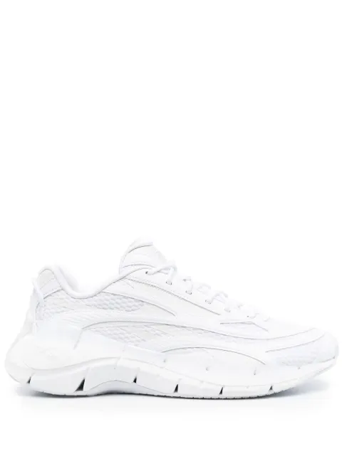 Reebok tenis con paneles texturizados