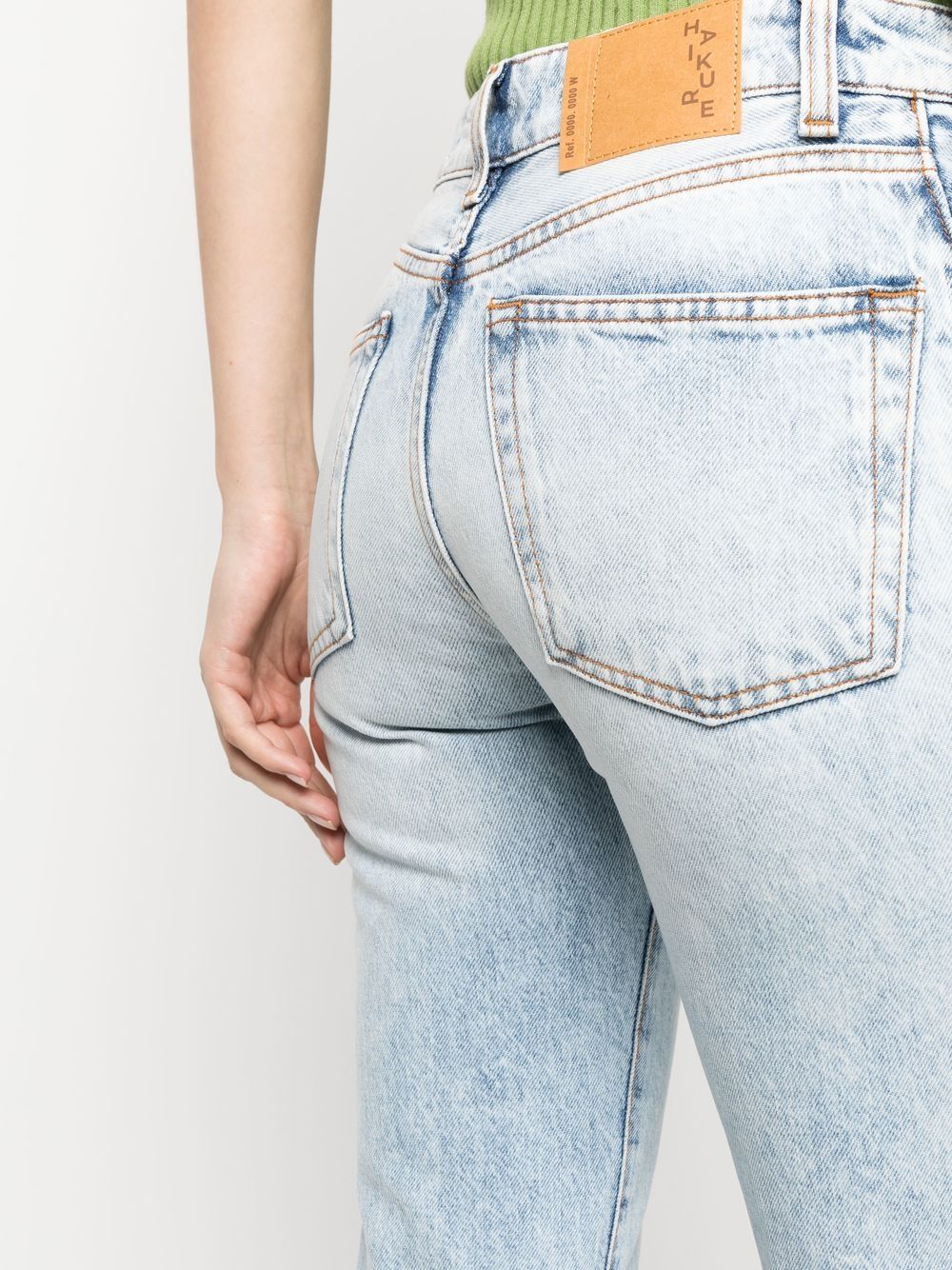 Shop Haikure Low-rise Flared Jeans In Blue