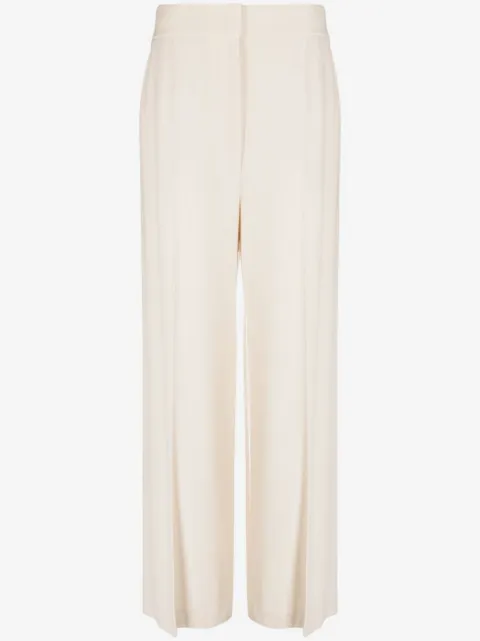 KHAITE high-waisted wide-leg trousers
