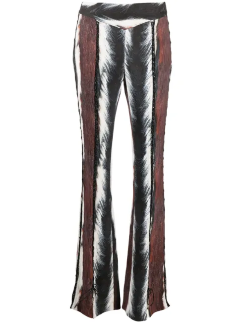Roberto Cavalli pantalones con agujetas y animal print