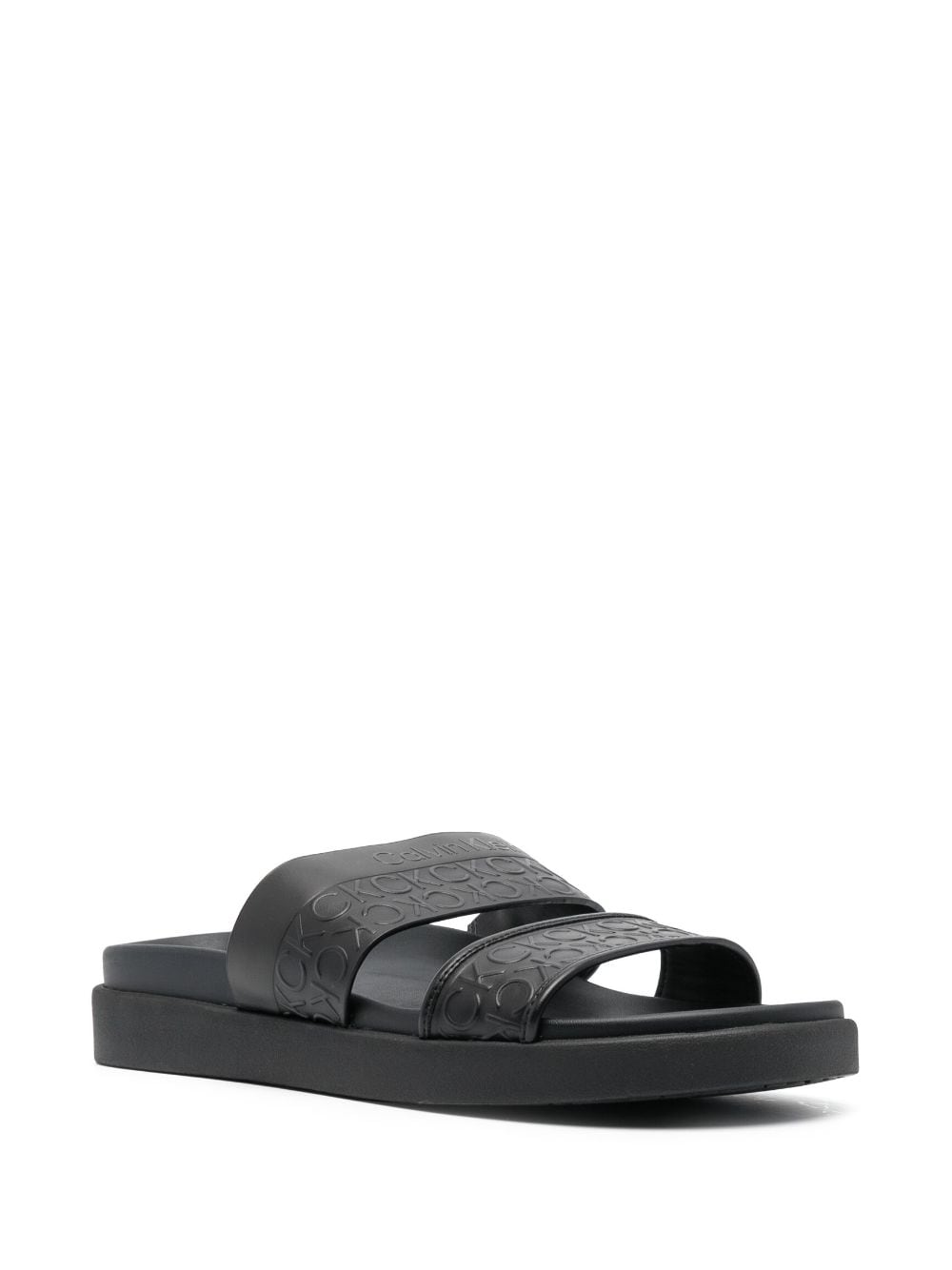 Shop Calvin Klein Embossed-logo Leather Slides In Black