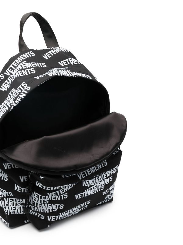 VETEMENTS logo-print Backpack | Black | FARFETCH AO