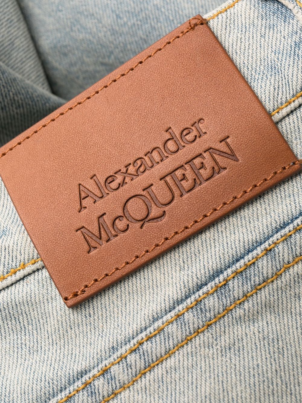 Alexander McQueen logo-patch washed cotton jeans Men