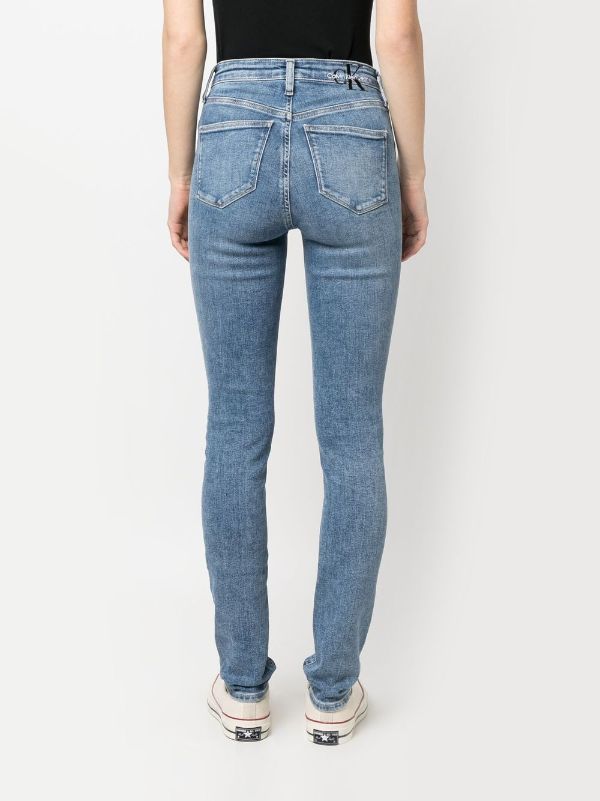 Calvin Klein Jeans logo-embroidered Skinny Jeans - Farfetch | Geldbörsen