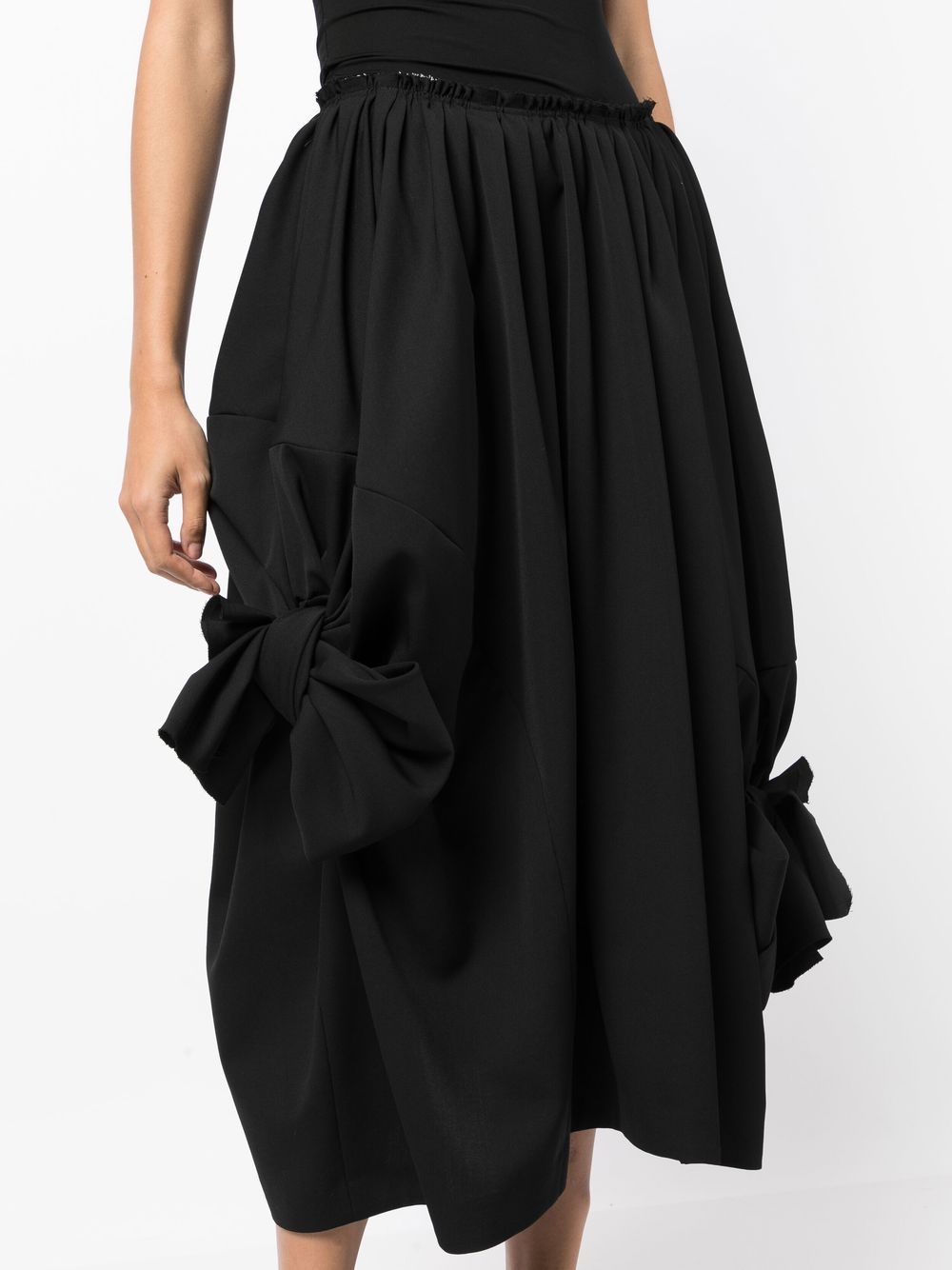 Asymmetrical skirt shop with bow