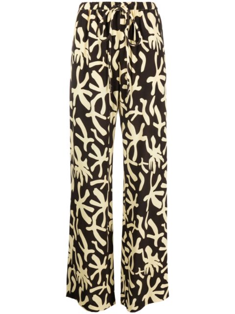 Nanushka pantalones con estampado abstracto