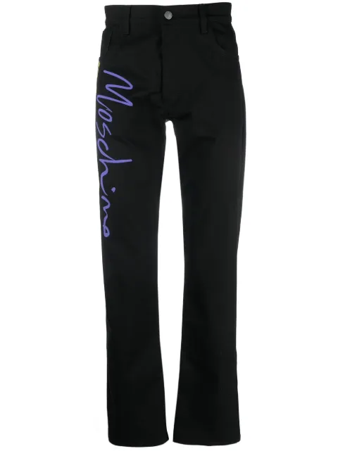 Moschino tailored logo-print trousers