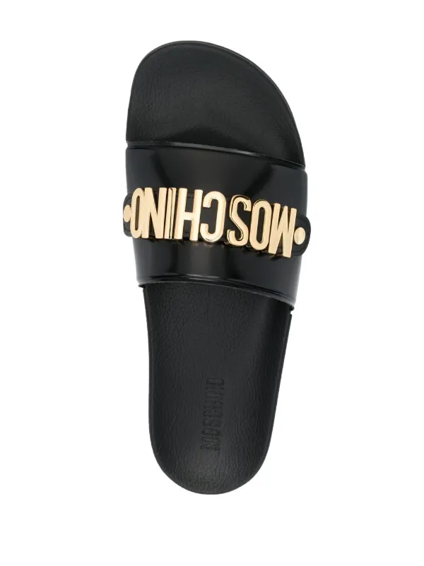 Moschino logo-lettering Open Toe Slides - Farfetch