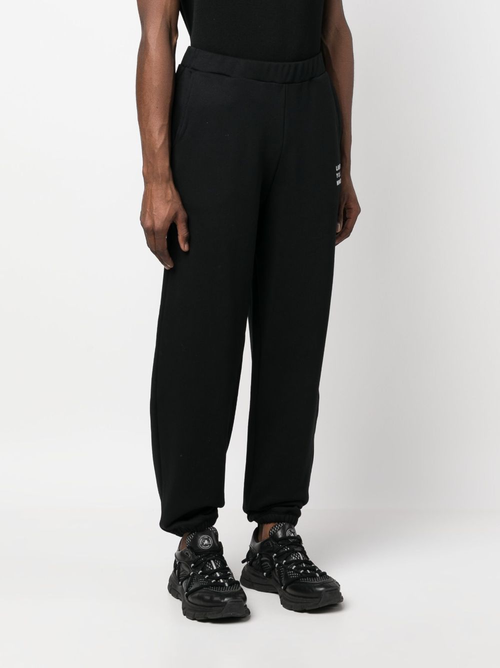 Shop Liberal Youth Ministry Logo-print Cotton Track Pants In Black