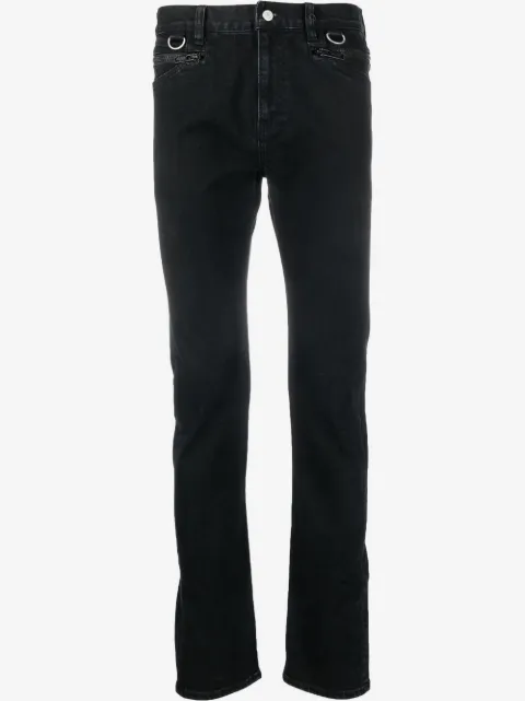 Undercoverism jeans rectos con bolsillos y cierre
