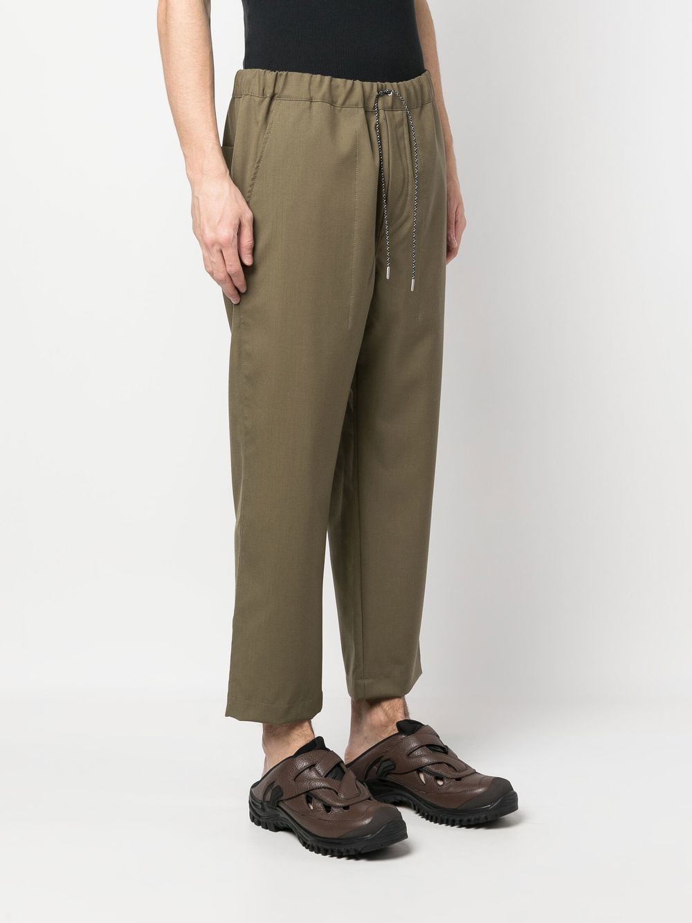 Shop Oamc Drawstring-waist Cropped Pants In Grün
