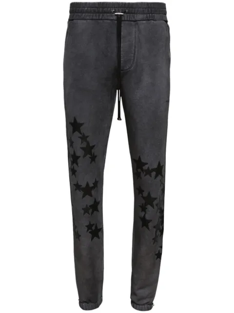 AMIRI Pigment Spray Star track pants
