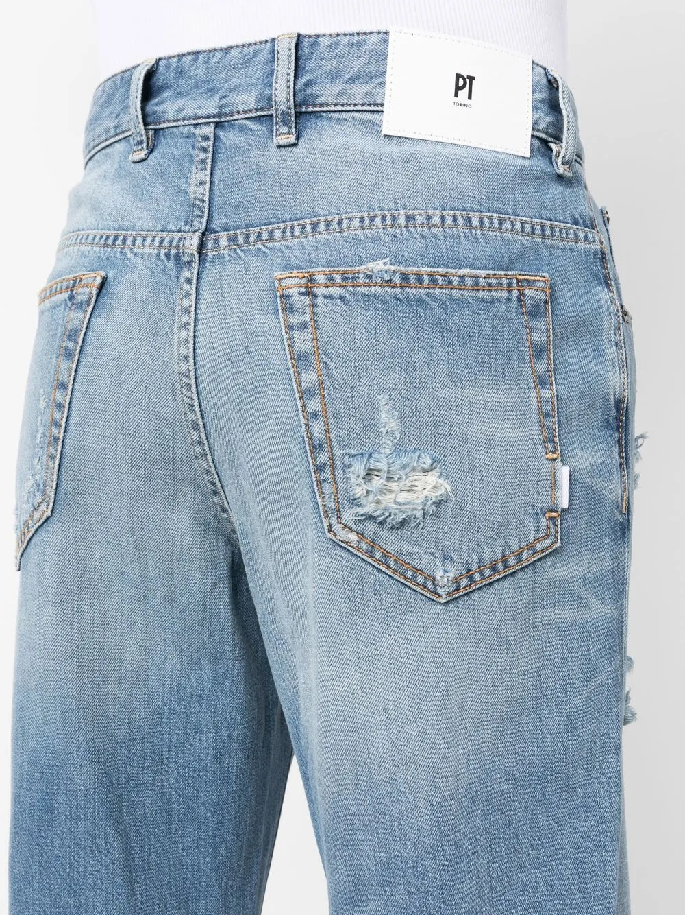 Pt torino ripped bleach effect jeans in blue modesens