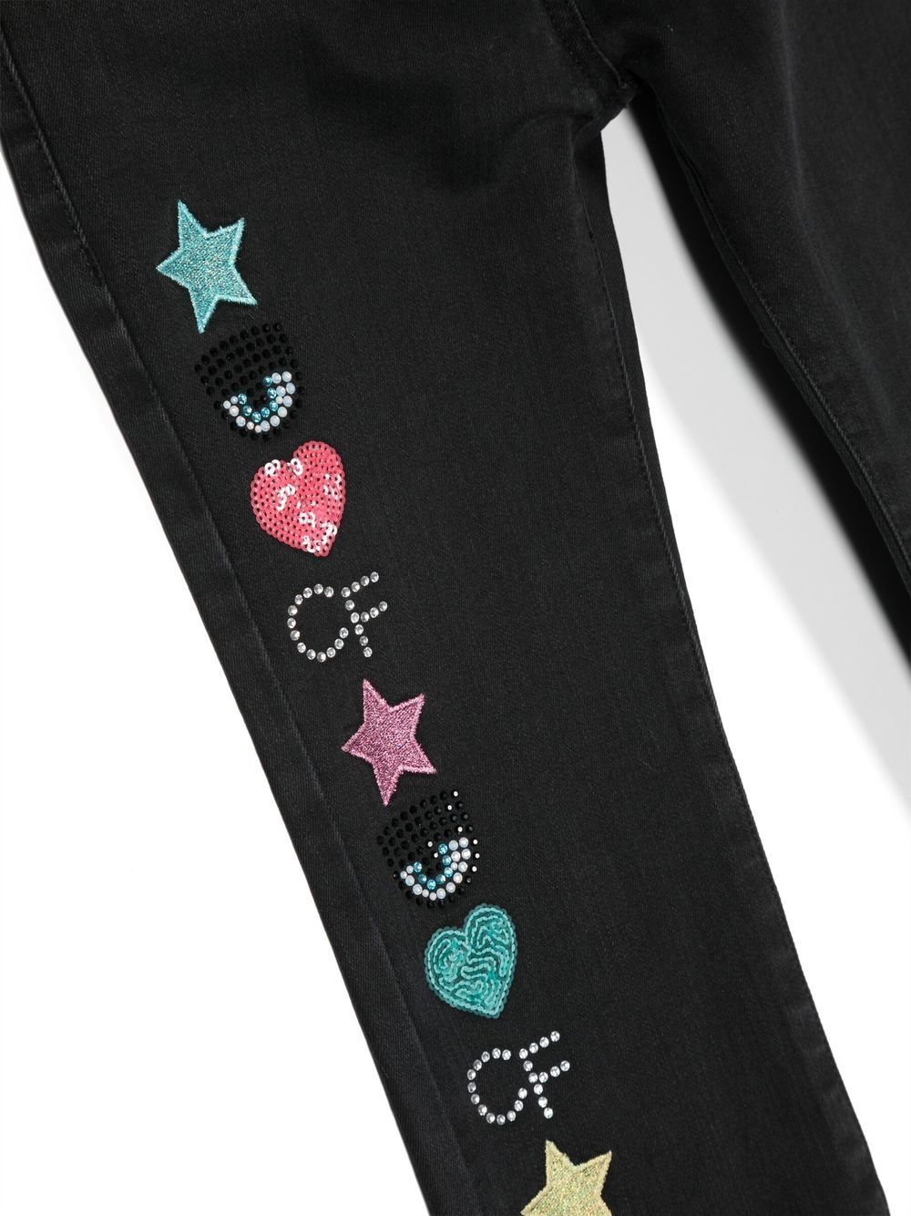 Shop Chiara Ferragni Flared Embellished-logo Detail Jeans In Black
