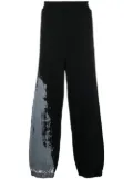 A-COLD-WALL* abstract-print track pants - Black