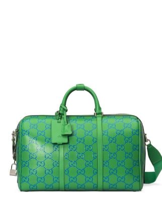 Gucci logo-embossed Holdall - Farfetch