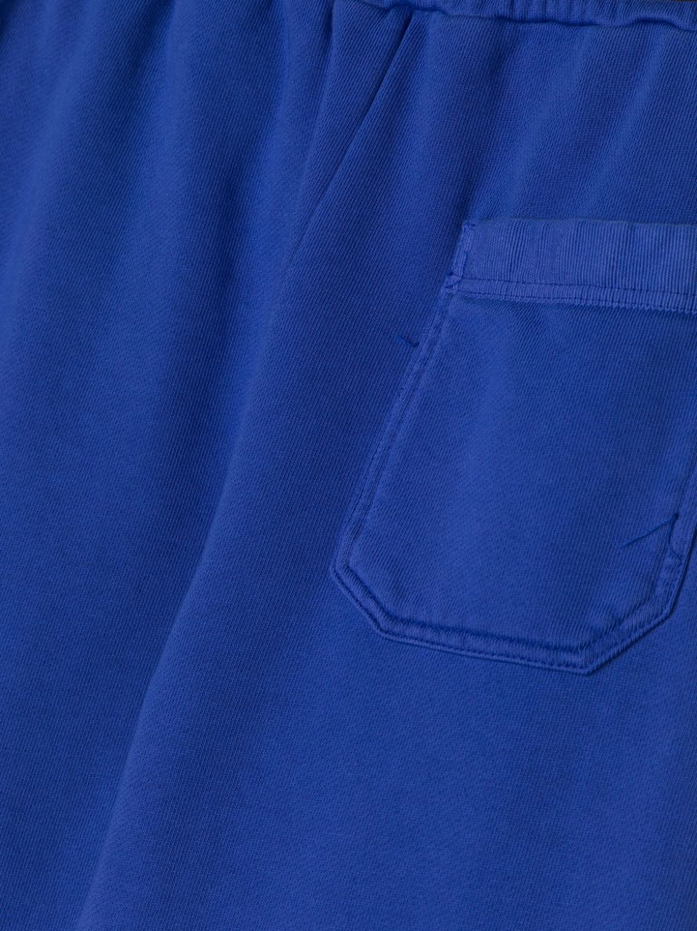 Shop Amiri Graphic Logo Print Track Pants In Blue