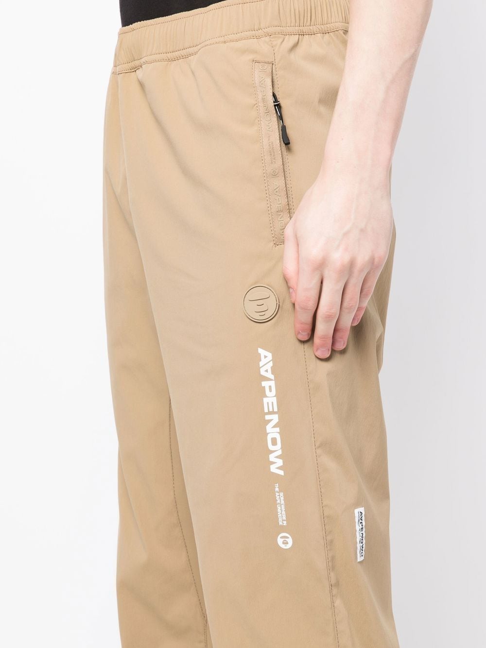Shop Aape By A Bathing Ape Logo-print Elasticated-ankles Trousers In Brown