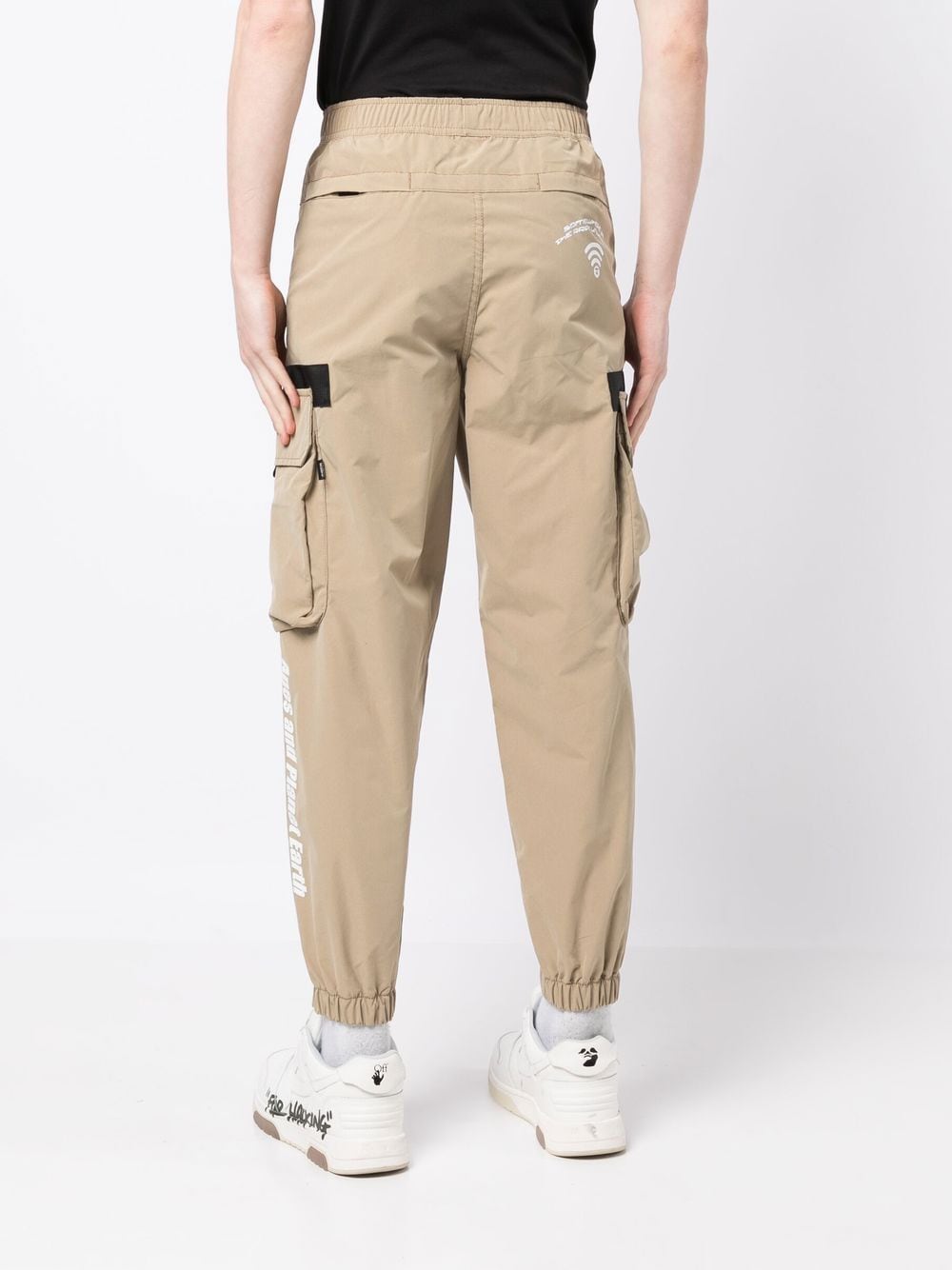 Shop Aape By A Bathing Ape Elasticated-waistband Tapered-leg Pants In Brown