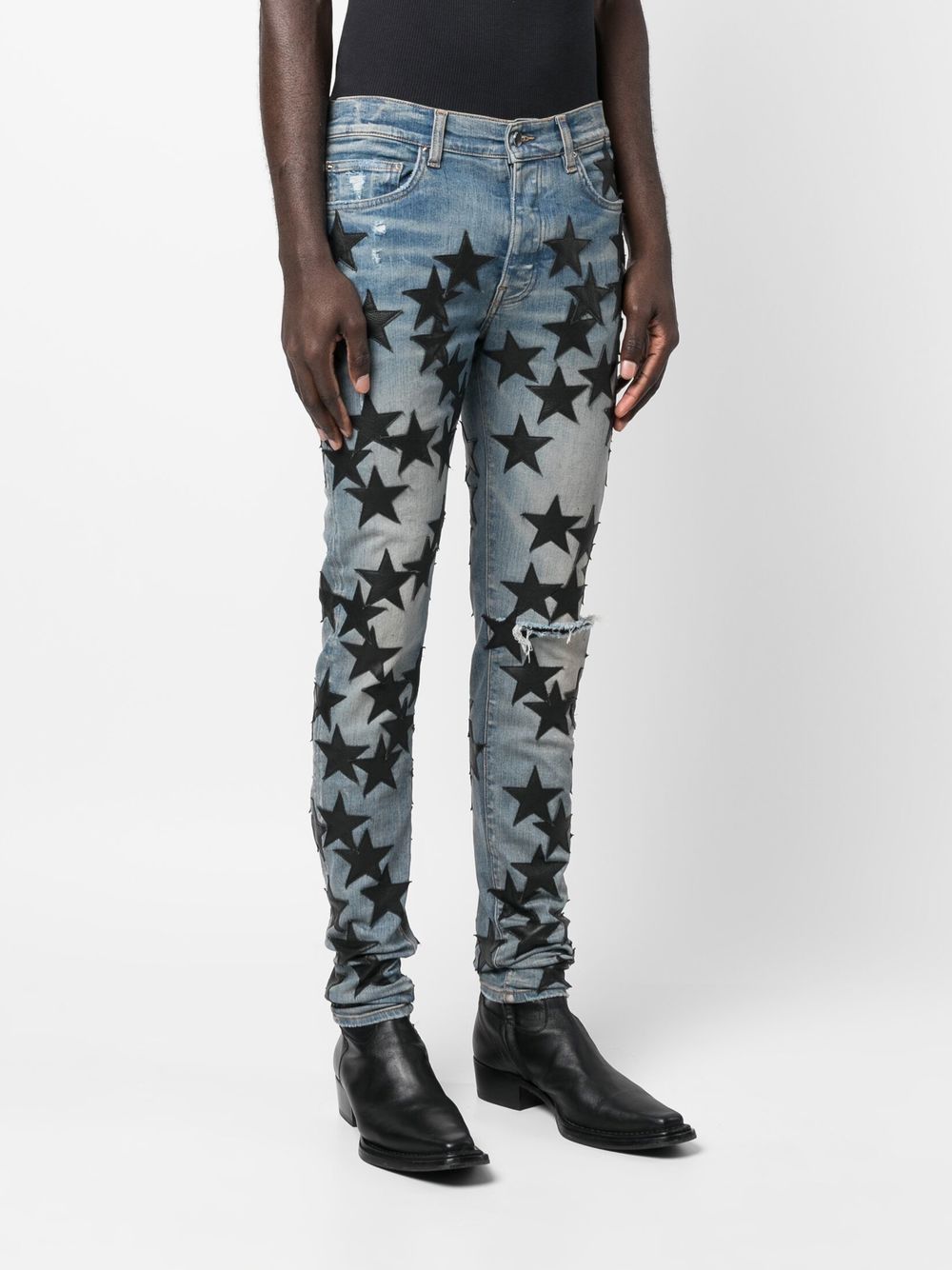 Shop Amiri Star Patch Skinny Jeans In Blau