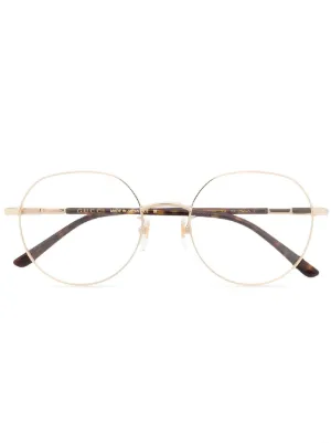 Gold gucci shop glasses frames