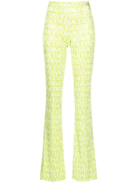 Versace logo-print flared trousers