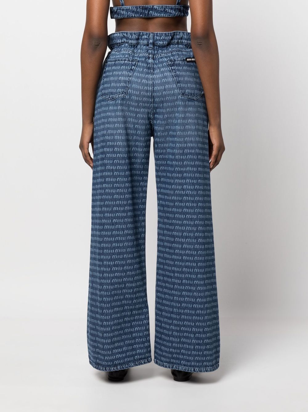 Miu Miu Logo Print wide-leg Jeans - Farfetch