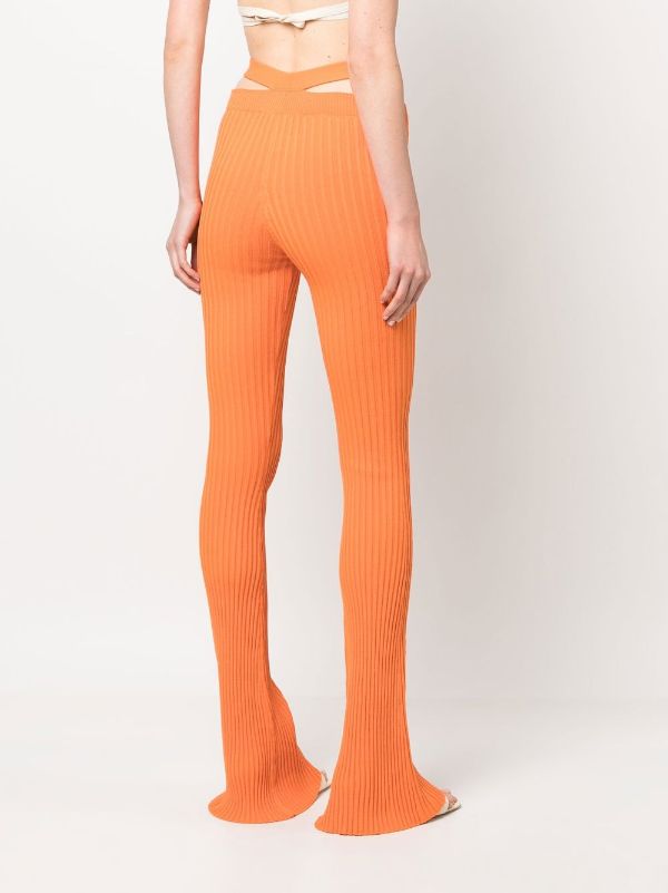 ANDREĀDAMO cut-out ribbed-knit Flared Trousers - Farfetch