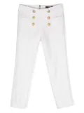 Balmain Kids embossed-buttons trousers - White