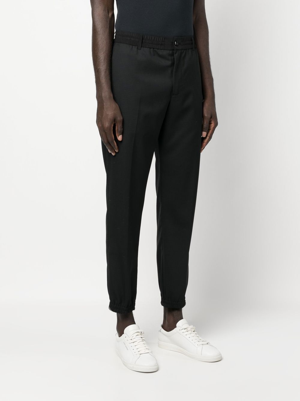 Shop Emporio Armani Elasticated-waistband Tapered Trousers In Schwarz