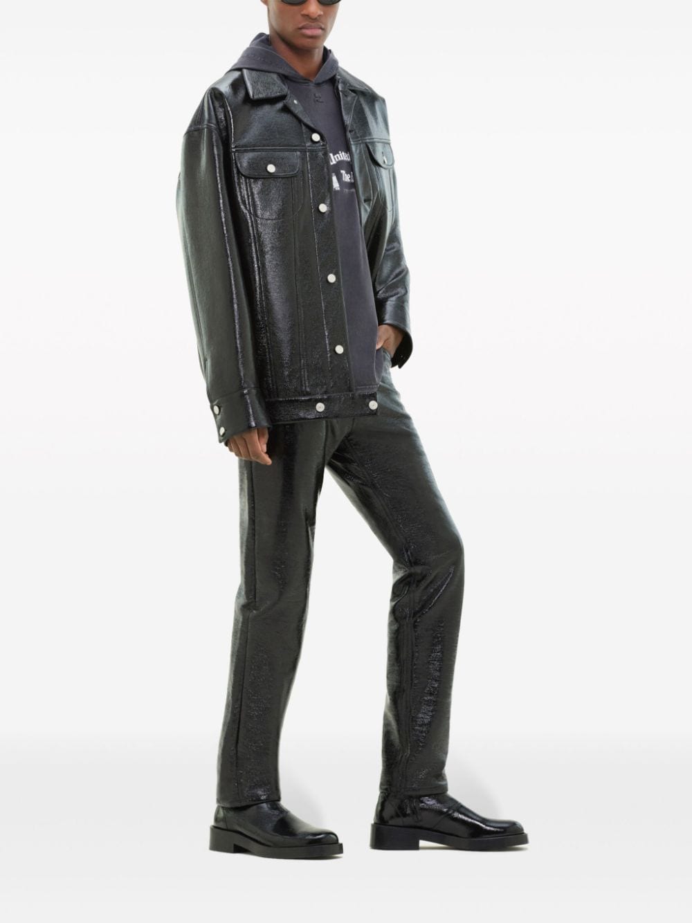 Shop Courrèges Shine-effect Biker Jacket In Schwarz