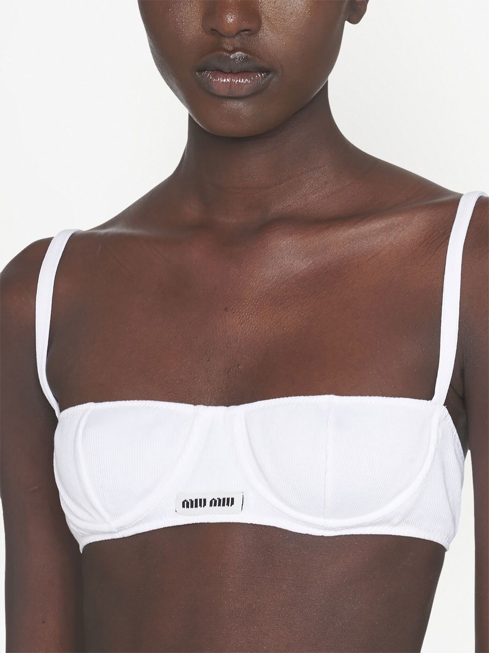 Miu Miu on X: Miu Miu L'Été features the satin bra with knit logo label.  Discover more at  #MiuMiu  /  X
