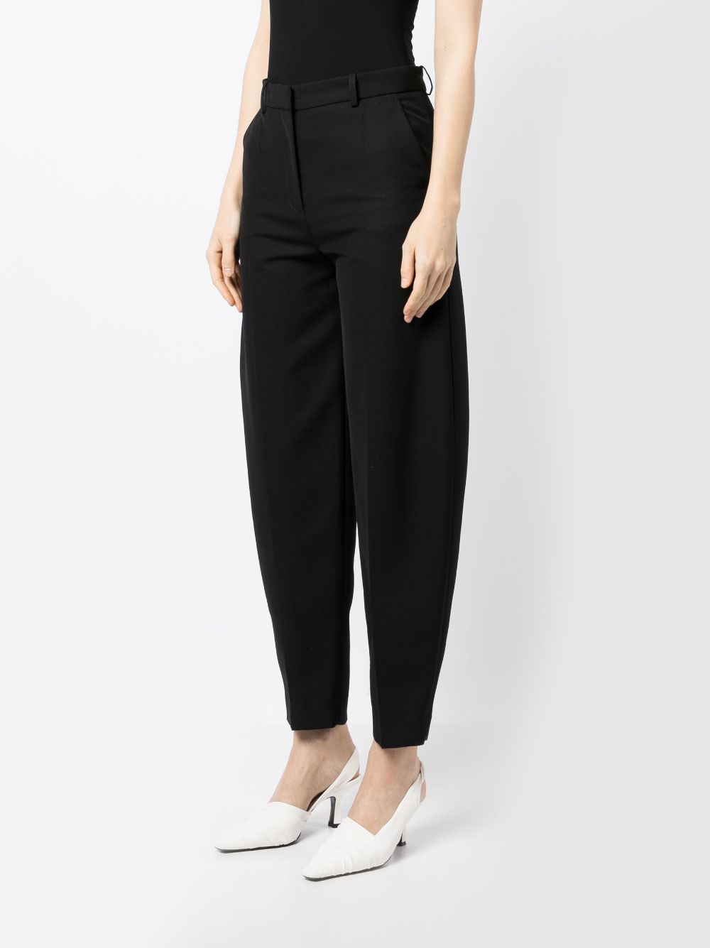 Shop Totême High-waisted Tapered Trousers In Schwarz